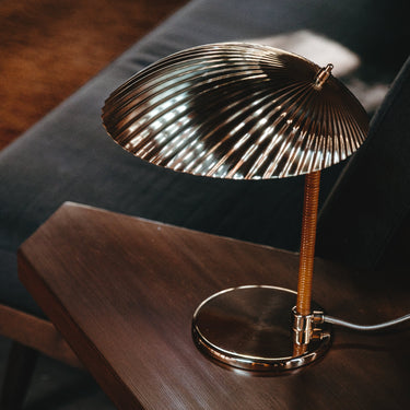 gubi tynell 5321 table lamp shade detail on warm walnut wood table