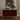 Vintage ostuni table lamp on knoll credenza with plant and lamp, framed poster on the wall