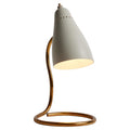 Ostuni white Table lamp with a gray cone-shaped shade and gold curved base on a white background