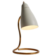 Ostuni white Table lamp with a gray cone-shaped shade and gold curved base on a white background