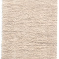 off white wool nanimarquina wellbeing shaggy rug on a white background