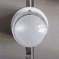 white fresnel wall light oluce front view