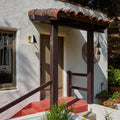 ZUZU polished Brass wall sconce on spanish style los angeles home